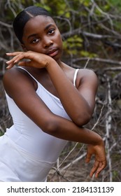 Gorgeous Headshot Of A Young And Talented Dancer Wearing All White Outside.