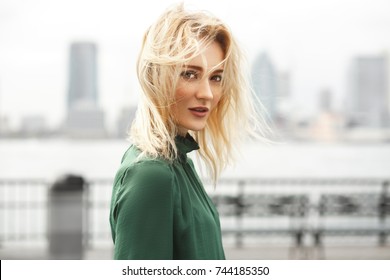 Gorgeous Lady In Green Dress Poses Before A River In New York