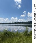 Gorgeous lake with huge poofy clouds 