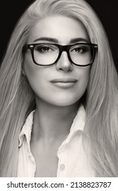 Gorgeous Midle-age Woman With Spectacles Looking At Camera. Eyewear And Clear Vision Concept. Monochrome Portrait In Vertical Format