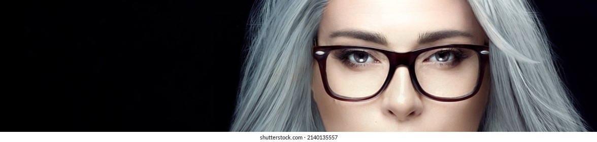 Gorgeous Midle-age Woman With Spectacles Looking At Camera. Eyewear And Clear Vision Concept. Closeup Banner Isolated On Black With Copy Space