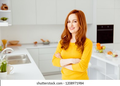 Gorgeous, nice, stunning, adorable, good-looking woman in yellow sweater stand in half turn on the modern light interior folded, cross hands over chest look at camera - Powered by Shutterstock