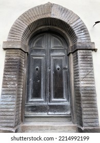 Gorgeous Old Brown Door And Frame Of Old Bricks Built Around It