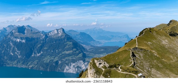 Gorgeous panoramic hiking trail in Stoos, from Mount Klingenstock to Mount Fronalpstock in the Swiss mountains. Mountain landscape. Influencer's paradise