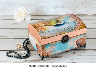 Gorgeous peacock jewellery box gilded with copper leaf