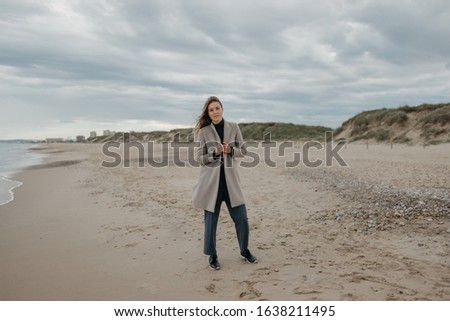 Similar – Pretty healthy woman enjoying a hike on a beach