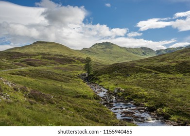 Gorgeous Scenery Of A River Running Through Ben Lawers, Scotland