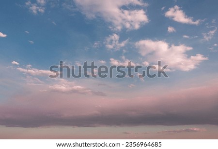 Gorgeous Sunset or sunrise sky at the horizon in the rural countryside. pinky sky atmosphere with silhouette trees and mountains background. cloudscape timelapse natural landscape.