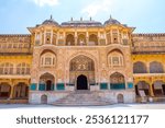 Gorgeous view of the Amer Fort and Palace (Amber Fort) overlooks Maota Lake in Jaipur, Rajasthan, India.
