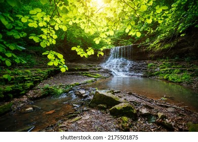 Gorgeous view of the unique waterfall on a sunny day. Location place Rusyliv Falls, Carpathian, Ukraine, Europe. Vibrant photo wallpaper. Picturesque nature photography. Discover the beauty of earth. - Powered by Shutterstock