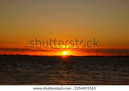Gorgeous waterfront sunsets with a breathtaking sun.