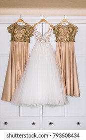 Gorgeous Wedding Dress And Beige Gowns For Bridesmaids Hang Over The Bad