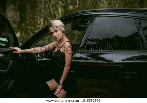 Gorgeous woman with a car, luxury style,
concept lady and
automobile