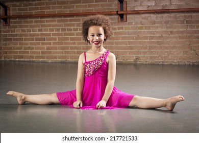 Gorgeous young ballerina at a dance studio