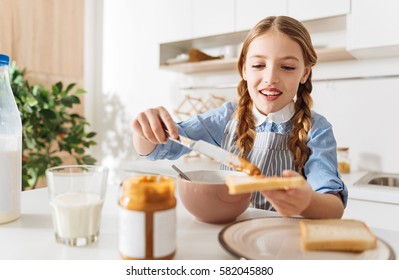 Gorgeous Young Lady Making Herself Breakfast