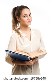 Gorgeous young student girl holding books.