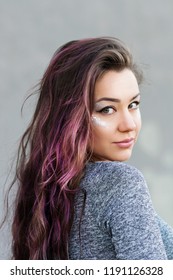 Gorgeous Young Woman With Long Luscious Hair, Wearing Glitter Makeup. Closeup Outdoors Portrait, Natural Lighting, Medium Retouch.