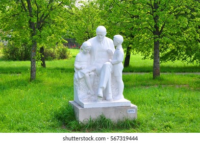 GORKI LENINSKIE, RUSSIA - MAY 11, 2016: Sculpture "Lenin and children" by sculptor Nikolai Shcherbakov at the Museum-Reserve Leninskie Gorki. This sculpture was made of marble in 1966
