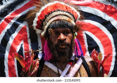 GOROKA, PAPUA, NEW GUINEA - SEPTEMBER 17: colorful portrait of  an aboriginal at Goroka Tribal Festival. Papua New Guinea on September 17, 2011 in Goroka, Papua New Guinea. - Shutterstock ID 113145091