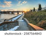 Gorzow Wielkopolski boulevard overlooking Old Town bridge  at sunset. Poland