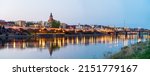 Gorzow Wielkopolski city evening skyline seen across Warta river. Poland