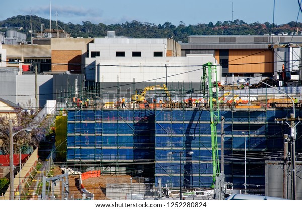 Gosford, New South\
Wales, Australia - September 7, 2018: Construction and building\
work on Gosford Hospital redevelopment and New car parking\
facilities. Progress Update\
H24ed.