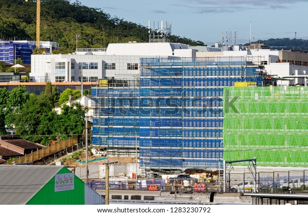 Gosford,\
New South Wales, Australia - December 6, 2018: Construction and\
building work on Gosford Hospital redevelopment and New car parking\
facilities. Progress Update\
H74ed.\
\
\
\
\
\
