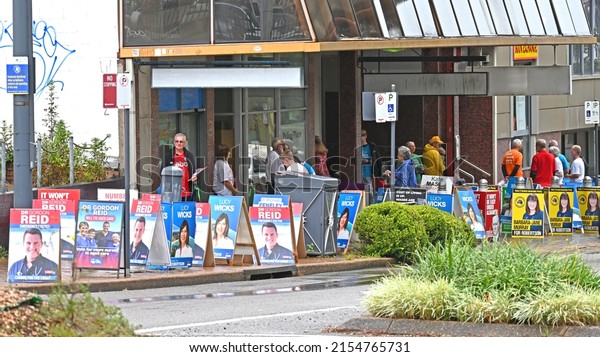 Gosford,\
New South Wales Australia – May 11, 2022 People lined up for early\
voting in the 2022 Australian federal\
election.