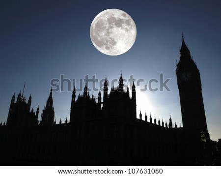 Goth night view silhouette with full moon of the Houses of Parliament Westminster Palace London