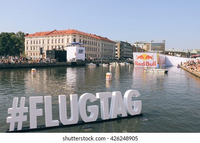 GOTHENBURG, SWEDEN - 22 AUGUST 2015: Red Bull Flugtag (airshow of homemade, human-powered flying machines) in front of Feskekorka, an indoor fish market in Gothenburg.