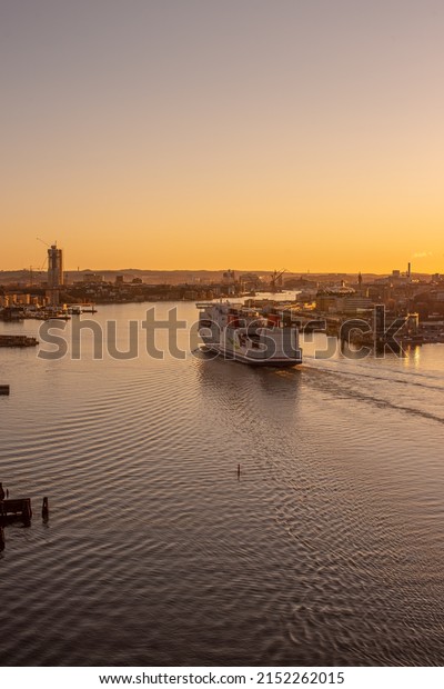 Gothenburg, Sweden -\
April 05 2022: Stena Jutlandica arriving port of Gothenburg in\
early morning sun.