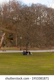 Gothenburg, Sweden - April 10 2021: Small Group Having An Outdoor Party In A Park During Covid-19 Restrictions