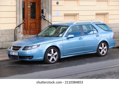 GOTHENBURG, SWEDEN - AUGUST 26, 2018: Blue Saab 9-5 Station Wagon Family Car Parked In Gothenburg, Sweden. There Are 4.8 Million Passenger Cars Registered In Sweden.