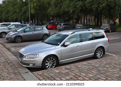 GOTHENBURG, SWEDEN - AUGUST 26, 2018: Volvo V70 Silver Family Station Wagon Car Parked In Gothenburg, Sweden. There Are 4.8 Million Passenger Cars Registered In Sweden.