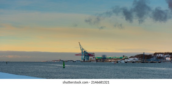 Gothenburg, Sweden - december 04 2021: Container cranes of Scandiahamnen at winter.
