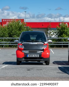 Gothenburg, Sweden - July 07 2022: Smart MCC Two Seater Micro Car On A Parking Lot.