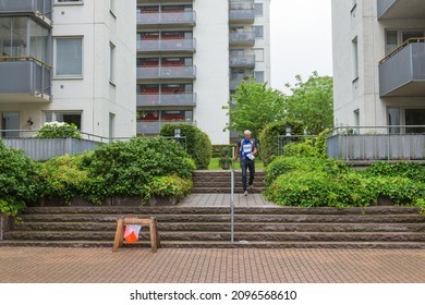 GOTHENBURG, SWEDEN - JULY 26,  2015: Man Approaching Control Point During Orienteering Race