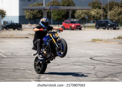 Gothenburg, Sweden - June 5, 2022: Stunt Rider On A Motorcycle, Wheelie