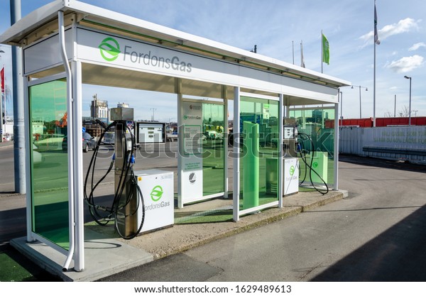 Gothenburg, Sweden,\
March 18, 2016. Drive eco friendly and refuel green fuel, gas at a\
gas station with a gas\
pump.