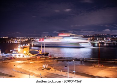 Gothenburg, Sweden - November 28 2021: Long Exposure Photo Of A Stela Line Ferry Leaving Gothenburg At Night.