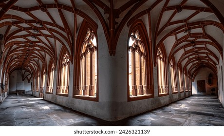 Gothic Architecture Showcased in Sunlit Corridor of Medieval Monastery - Powered by Shutterstock