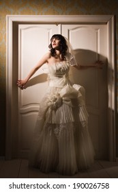 Gothic bride in the dark interior