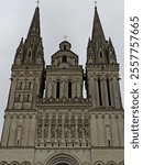 Gothic Cathedral with heavy buttresses outside, St Maurice Cathedral, Angers France