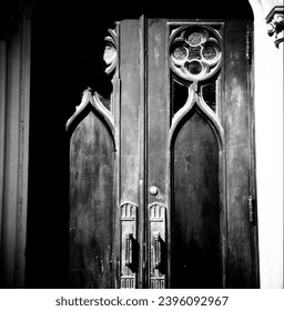 Gothic church doors at the Metropolitan United Church in Toronto. Ferrania P30, Zeiss Ikon Nettar, October 2023.