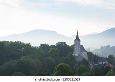 Gothic Church In Turciansky Dur Village On A Hazy Summer Morning.