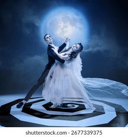 Gothic couple dancing in moonlight with dramatic pose on spiral stage. Concept of Halloween gothic fashion, dark romance, horror cinema, music cover, and avant-garde editorial.