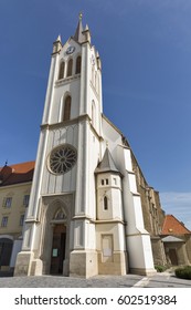 Gothic Franciscan Parish Church In Kezsthely, Hungary. Built In 1390 And Renovated In 19th Century In Baroque Style, Giving It An Imposing Neo Gothic Tower.