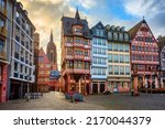 Gothic Frankfurt Cathedral and colorful half-timbered houses on historical Roemerberg square in Frankfurt am Main city center, Germany