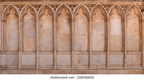 Gothic pointed arches on the outside wall of a church