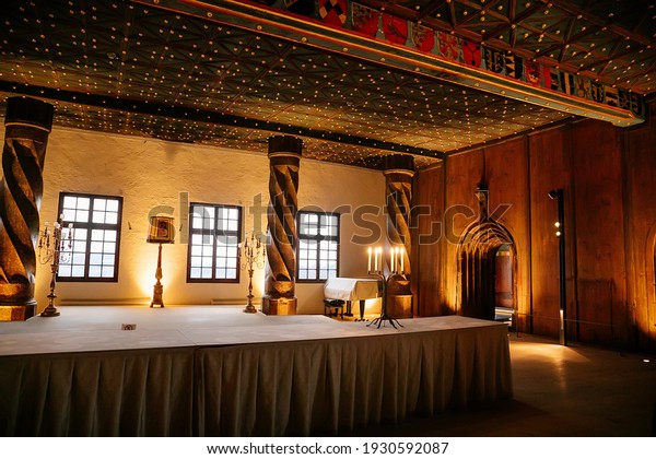 Gothic and Renaissance castle interior, Regency\
Golden Chamber or Royal Apartment, State Rooms in Hohensalzburg\
Fortress, wood paneling, carved ceiling, Salzburg, Austria,\
December 05, 2017